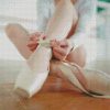 Ballerina Putting On Ballet Shoe Diamond Paintings